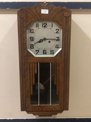 Lot 267 - AN ART DECO OAK WALL CLOCK