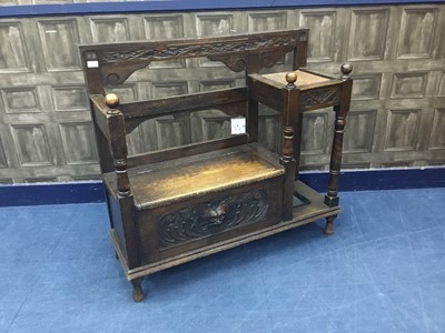 Lot 312 - AN OAK TELEPHONE TABLE