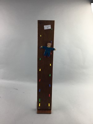 Lot 211 - A WOODEN CASCADING FIGURE TOY