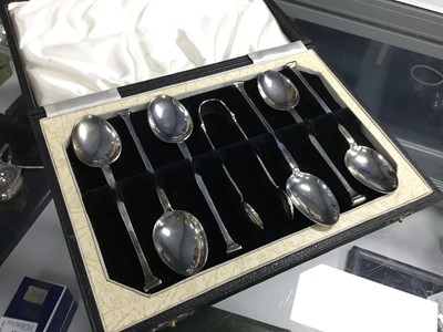 Lot 396 - A SET OF TWELVE SILVER TEASPOONS AND A SET OF TWELVE SILVER TEASPOONS AND TONGS