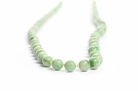 Lot 223 - EARLY TWENTIETH CENTURY GREEN HARDSTONE...