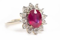 Lot 227 - NINE CARAT GOLD RUBY AND DIAMOND RING the...