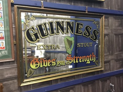 Lot 432 - A VINTAGE GUINNESS 'GIVES YOU STRENGTH' PUB MIRROR