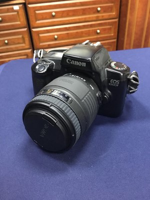 Lot 446 - A CANON EOS 1000F CAMERA