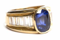 Lot 237 - SAPPHIRE AND DIAMOND RING the oval sapphire...