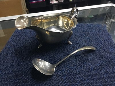 Lot 506 - A SILVER SAUCEBOAT AND A LADLE