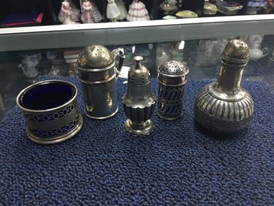 Lot 501 - A LOT OF FOUR SILVER PEPPER POTS AND A SALT DISH