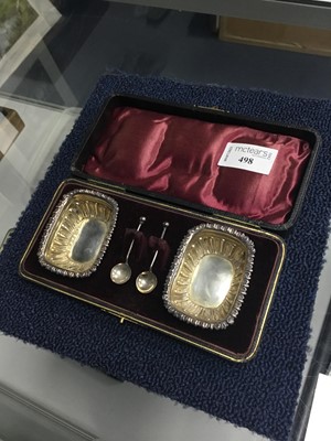 Lot 498 - A PAIR OF SILVER SALT DISHES WITH SPOONS