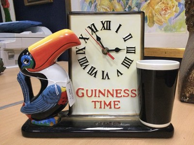 Lot 489 - A GUINNESS TABLE LAMP AND CLOCK