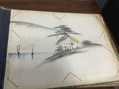 Lot 486 - A JAPANESE ALBUM OF PAINTINGS AND AN ALBUM OF STAMPS