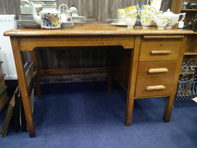 Lot 527 - AN OAK WRITING DESK