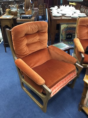 Lot 528 - A RETRO ARMCHAIR AND A SIMILAR ROCKING CHAIR