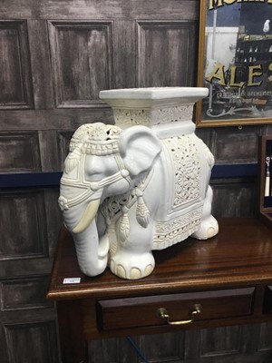 Lot 566 - A CERAMIC PLANT STAND MODELLED AS AN ELEPHANT