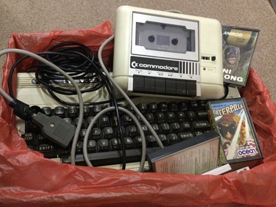 Lot 514 - A VINTAGE COMMODORE GAMES SYSTEM