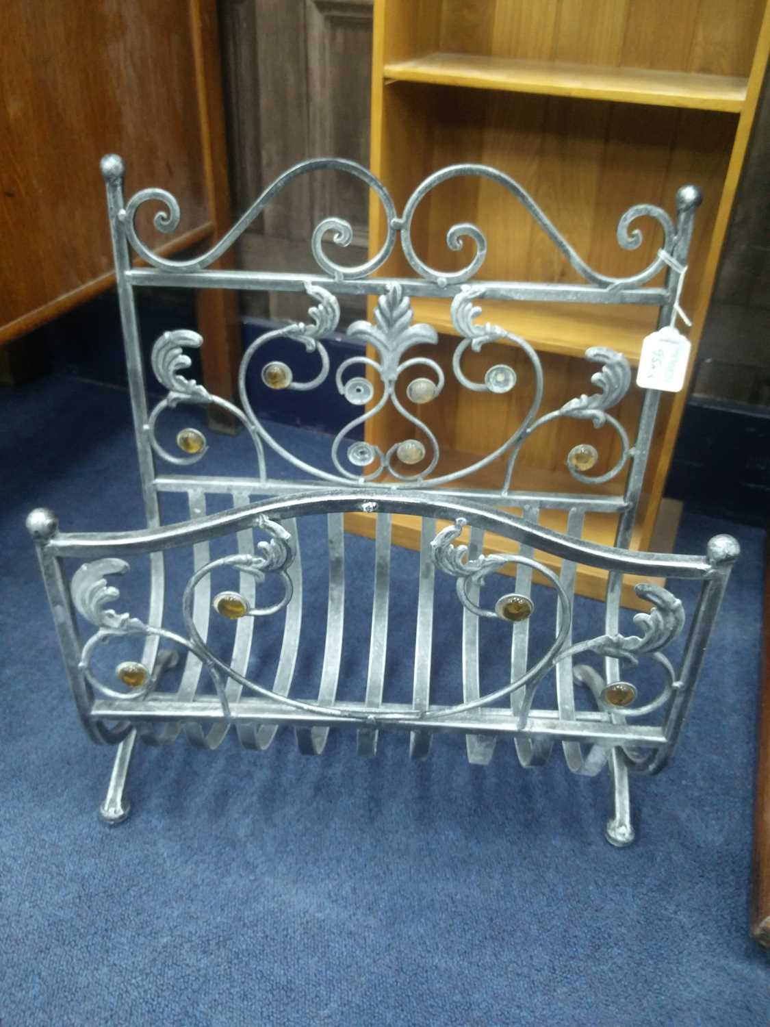 Lot 95 - A WROUGHT IRON LOG BASKET