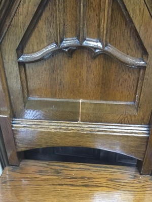 Lot 80 - A PAIR OF EARLY 20TH CENTURY OAK HALL CHAIRS