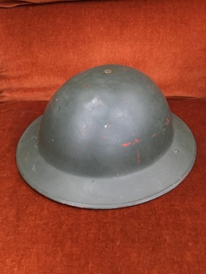 Lot 117 - A GROUP OF FOUR WWII MILITARY HELMETS