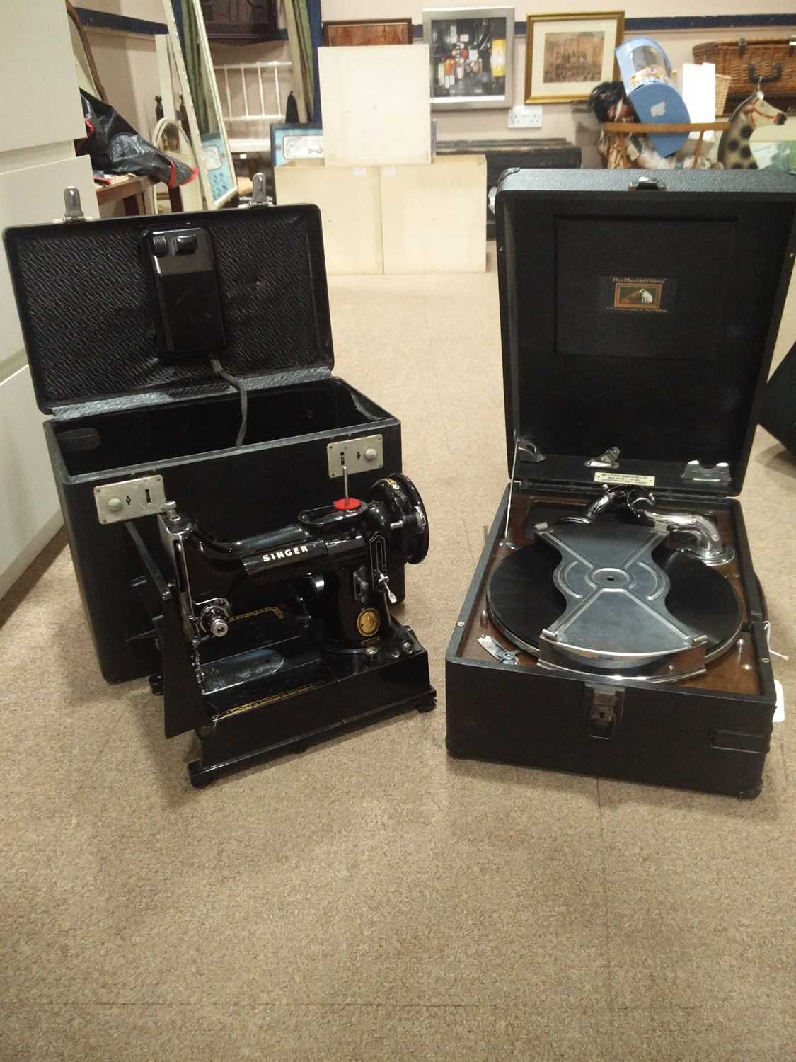 Lot 48 - A VINTAGE PORTABLE RECORD PLAYER AND A SINGER SEWING MACHINE