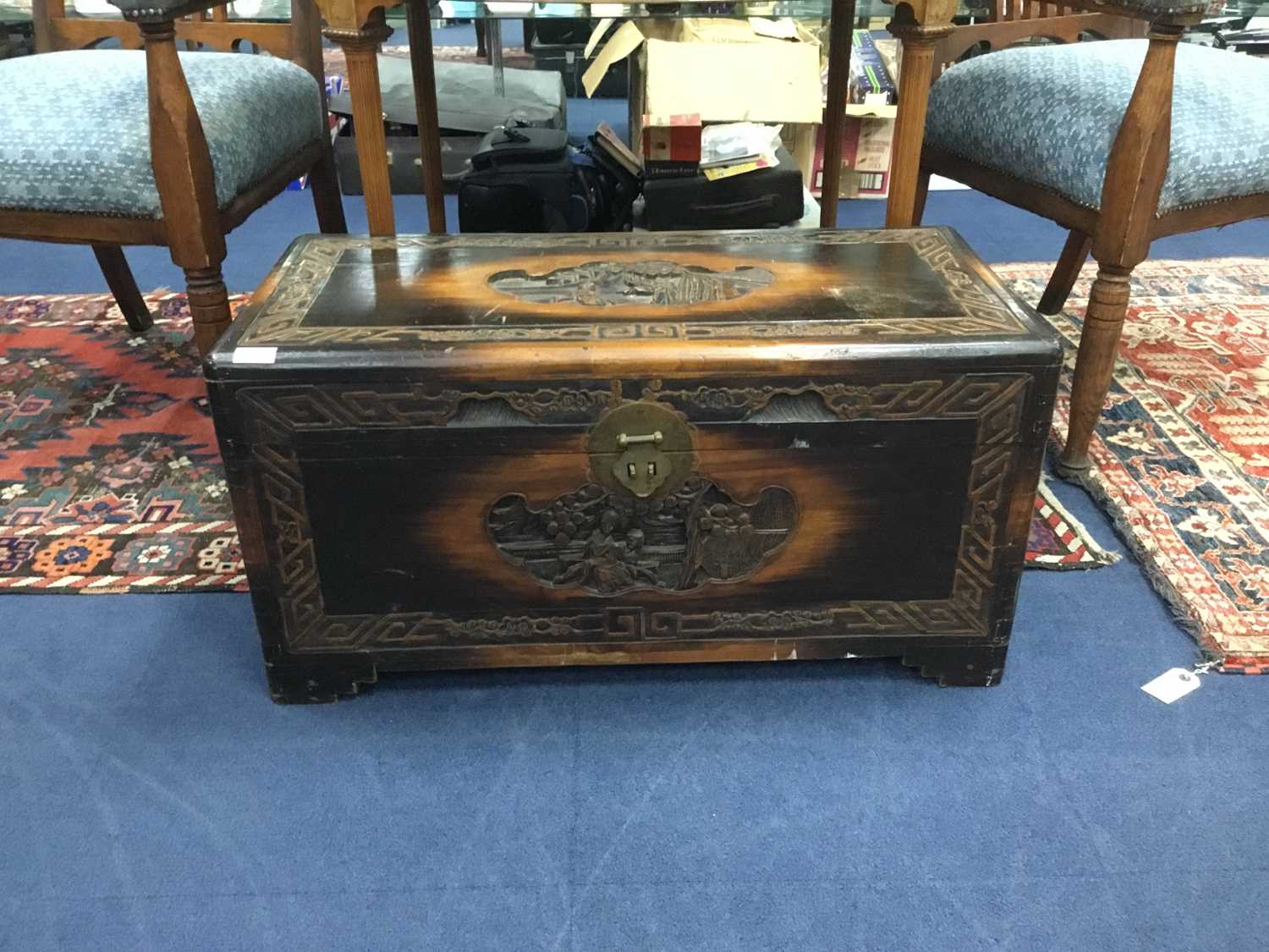 Lot 49 - A CHINESE CARVED WOOD BLANKET CHEST