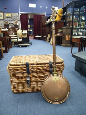 Lot 585 - A COPPER BED WARMING PAN AND A WICKER BASKET