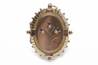 Lot 266 - VICTORIAN PEARL AND RUBY SET LOCKET of oval...