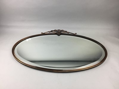 Lot 184 - AN EARLY 20TH CENTURY COPPER FRAMED OVAL WALL MIRROR