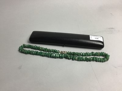Lot 130 - A JADE BEAD NECKLACE WITH SILVER CLASP