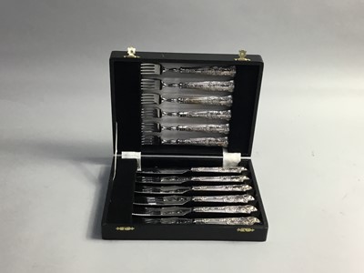 Lot 98 - A SET OF SILVER HANDLED FRUIT KNIVES AND FORKS