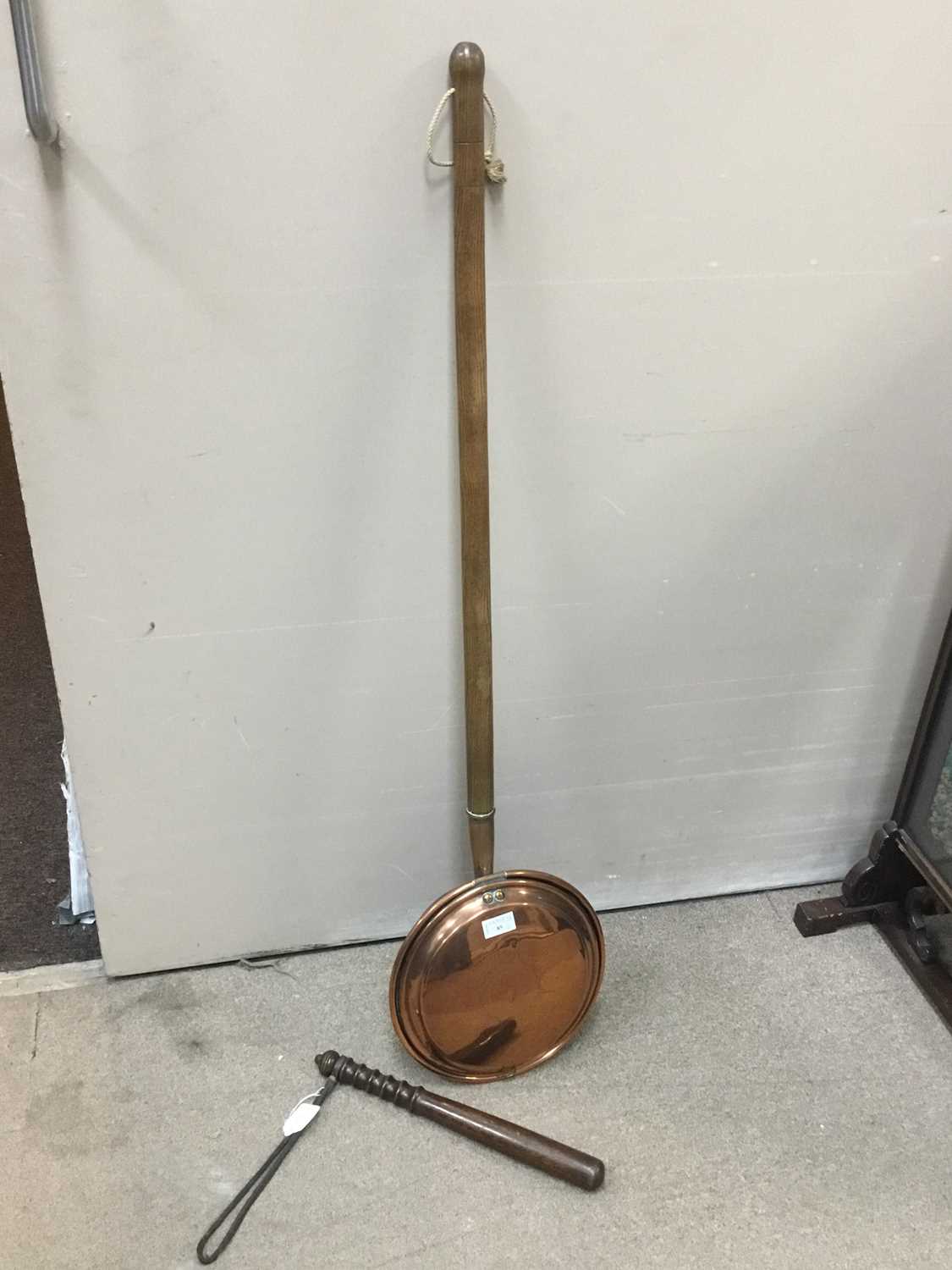 Lot 85 - A COPPER BED WARMING PAN AND A TRUNCHEON