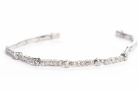 Lot 299 - EDWARDIAN DIAMOND SET BRACELET formed by old...