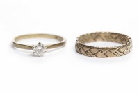Lot 300 - DIAMOND SOLITAIRE RING the brilliant cut stone...