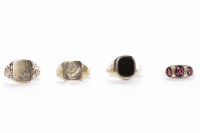 Lot 307 - FOUR NINE CARAT GOLD RINGS comprising three...