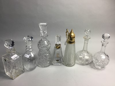Lot 348 - A GLASS CLARET JUG AND CRYTSLA AND GLASS DECANTERS