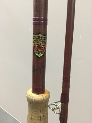 Lot 369 - A LOT OF FISHING RODS AND A FRAMED 'HARRY FAIRY FLIES' WALL HANGING