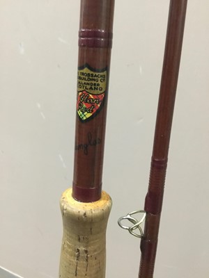 Lot 369 - A LOT OF FISHING RODS AND A FRAMED 'HARRY FAIRY FLIES' WALL HANGING