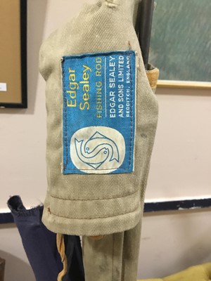 Lot 369 - A LOT OF FISHING RODS AND A FRAMED 'HARRY FAIRY FLIES' WALL HANGING