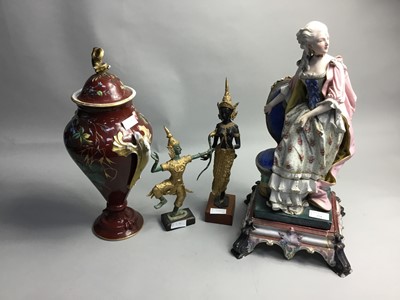 Lot 374 - A CONTINENTAL FIGURE OF A WOMAN, TWIN HANDLED LIDDED VASE AND TWO OTHER FIGURES