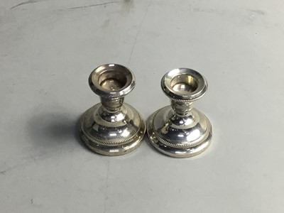 Lot 275 - A PAIR OF SILVER CANDLESTICKS