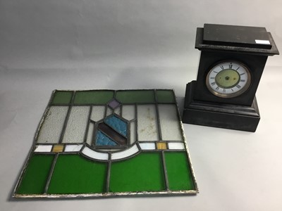 Lot 401 - A BLACK SLATE MANTEL CLOCK, STAINED GLASS PANEL AND IRON BASKET