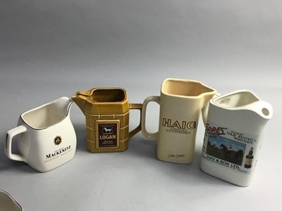 Lot 416 - A LOT OF FIFTEEN WHISKY WATER JUGS