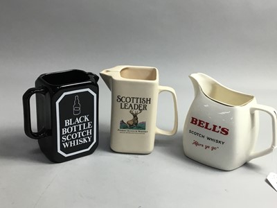 Lot 455 - A LOT OF FOURTEEN WHISKY WATER JUGS