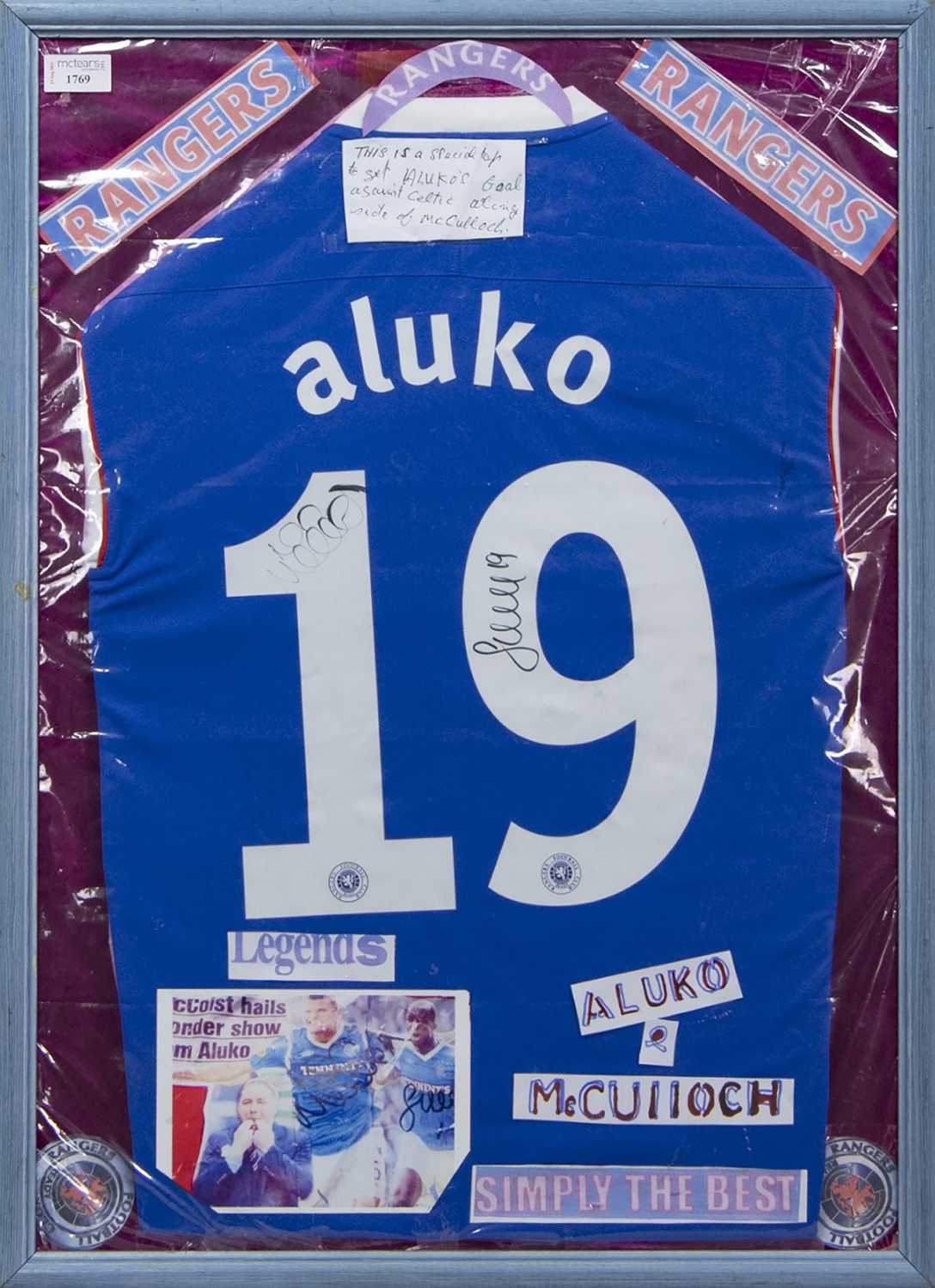 Lot 1769 - A LEE McCULLOCH AND SONE ALUKO SIGNED RANGERS F.C. JERSEY