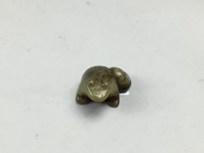 Lot 453 - A GREEN HARDSTONE FROG