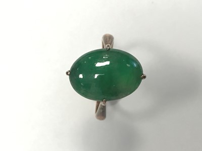 Lot 827 - A JADE  PENDANT AND RING
