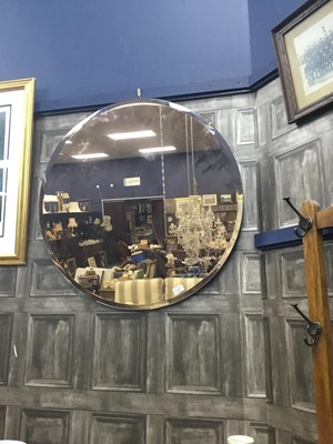 Lot 457 - A CIRCULAR BEVELLED WALL MIRROR