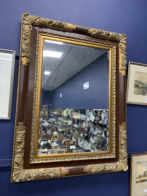 Lot 584 - A LARGE BEVELLED WALL MIRROR