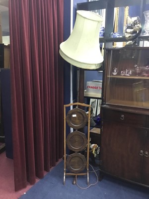 Lot 562 - A MAHOGANY STANDARD LAMP AND THREE TIER CAKESTAND