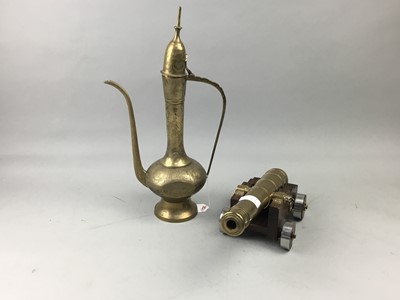 Lot 497 - AN EASTERN BRASS EWER, BRASS CANNON, COPPER KETTLE AND OTHER OBJECTS