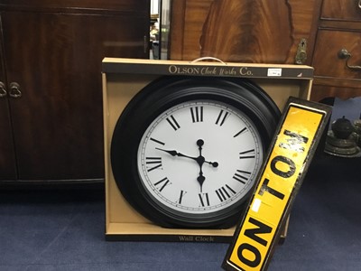 Lot 564 - AN OLSON CLOCK WORKS CO WALL CLOCK AND A BROKEN SIGN