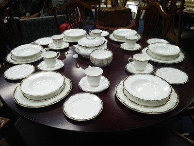 Lot 589 - A ROYAL DOULTON 'RHODES' PATTERN DINNER SERVICE